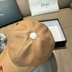 Beige monogram baseball cap top view with round snap button detail