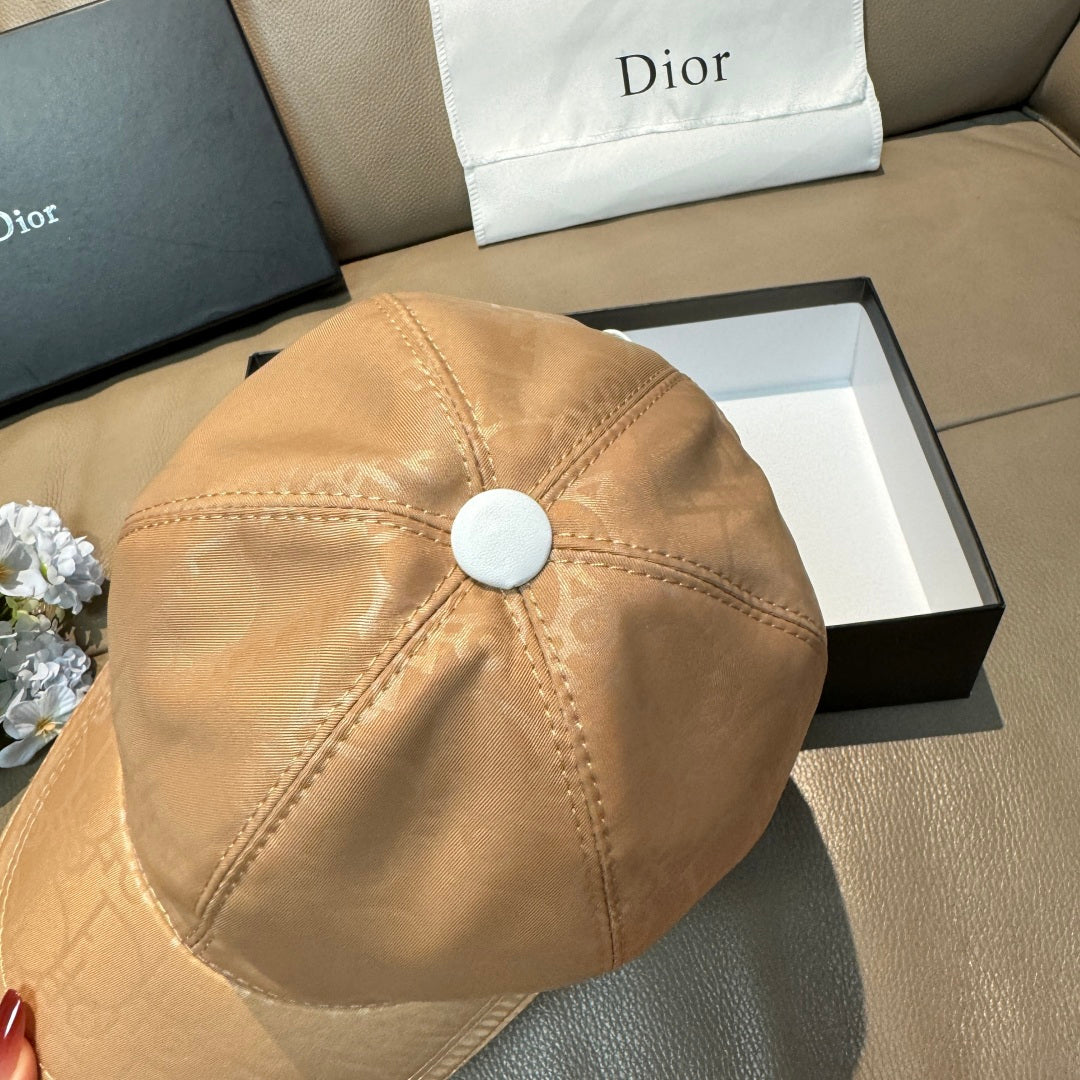 Beige monogram baseball cap top view with round snap button detail