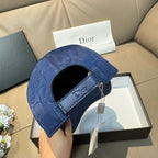 Blue monogram cap with side strap detail and Dior logo patch