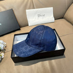 Blue monogram baseball cap on box, curved brim and embroidered-style pattern