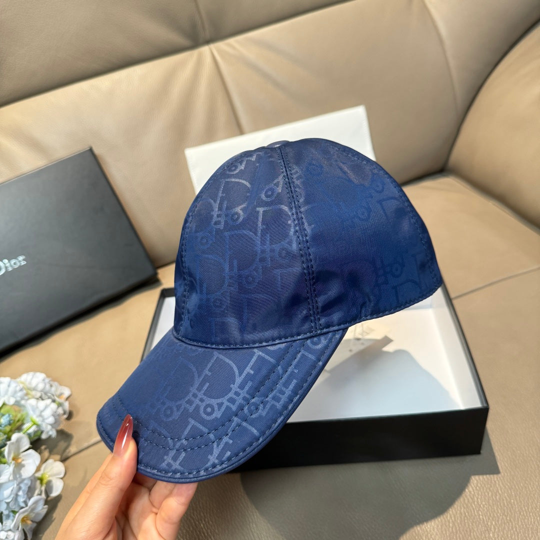 Blue monogram baseball cap with curved brim and front panel stitching