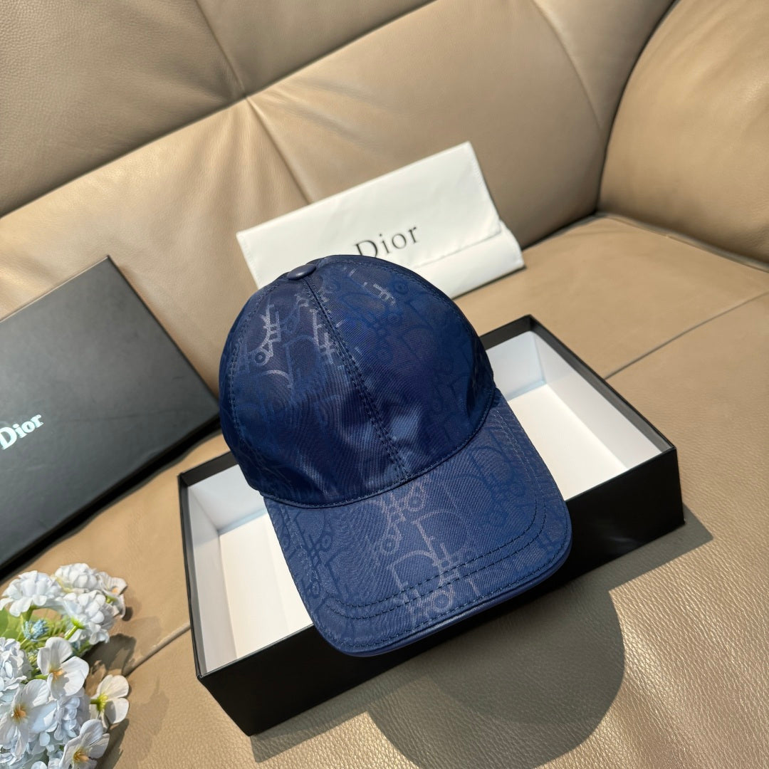 Blue Dior monogram baseball cap with curved brim and stitched panels