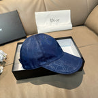 Blue monogram baseball cap with curved brim and top button