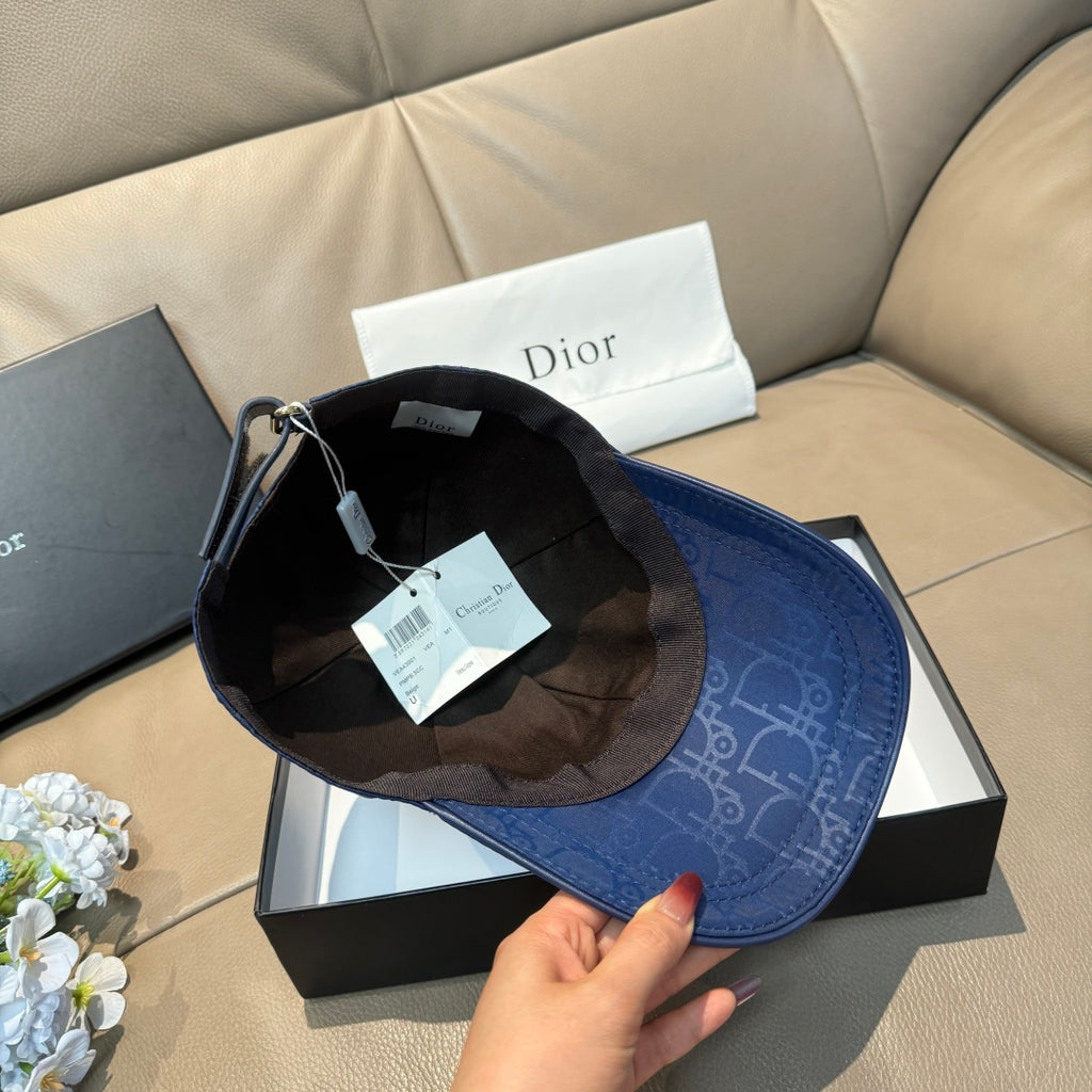 Dior monogram baseball cap with black interior lining and price tag