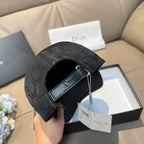 Dior cap with monogram-print strap detail and interior lining visible, side view