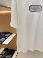 White short-sleeve T-shirt with straight hem and Christian Dior logo patch