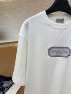 White short-sleeve T-shirt with Christian Dior logo patch and stitched V-neck
