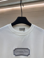 White short-sleeve T-shirt with V-stitch neckline and Christian Dior logo label