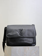 Black textured-leather crossbody bag with front flap and YSL logo emblem