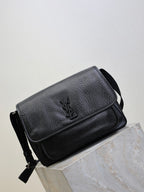 Black textured-leather crossbody bag with front flap and shoulder strap