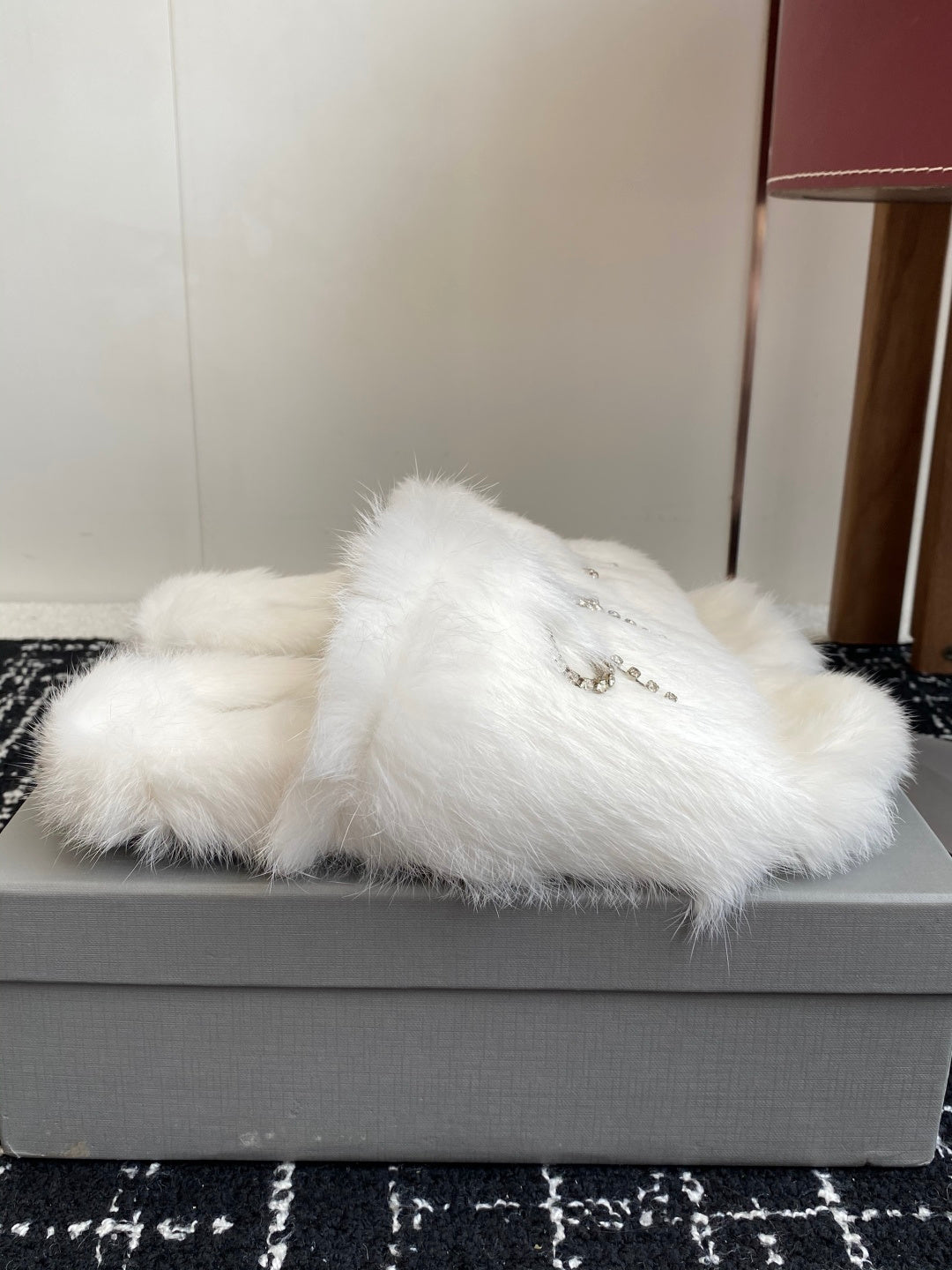 Balenciaga white faux-fur slide sandal with silver-tone bow chain detail