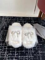Balenciaga white faux-fur slide sandals with beaded logo bow straps