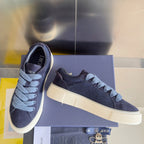 Unisex sneakers, dark blue suede with light blue laces and textured white sole