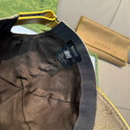 Gucci cap interior view with black lining and label on GG fabric shell