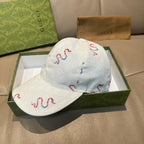 Gucci white canvas cap with red and blue snake embroidery, curved brim front