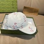 Gucci white canvas cap with red and blue snake embroidery, curved brim