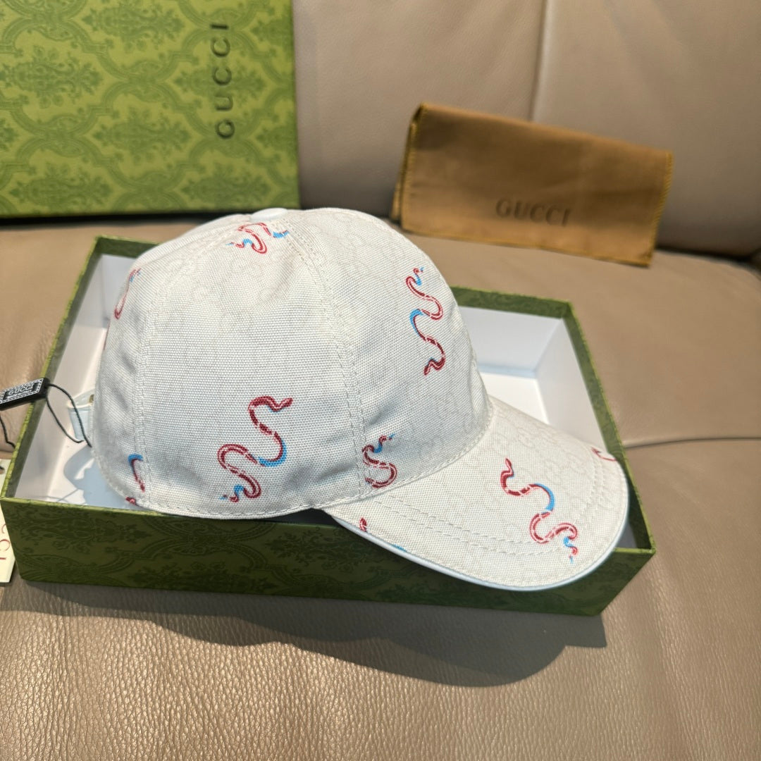 Gucci white canvas cap with red and blue snake embroidery, curved brim