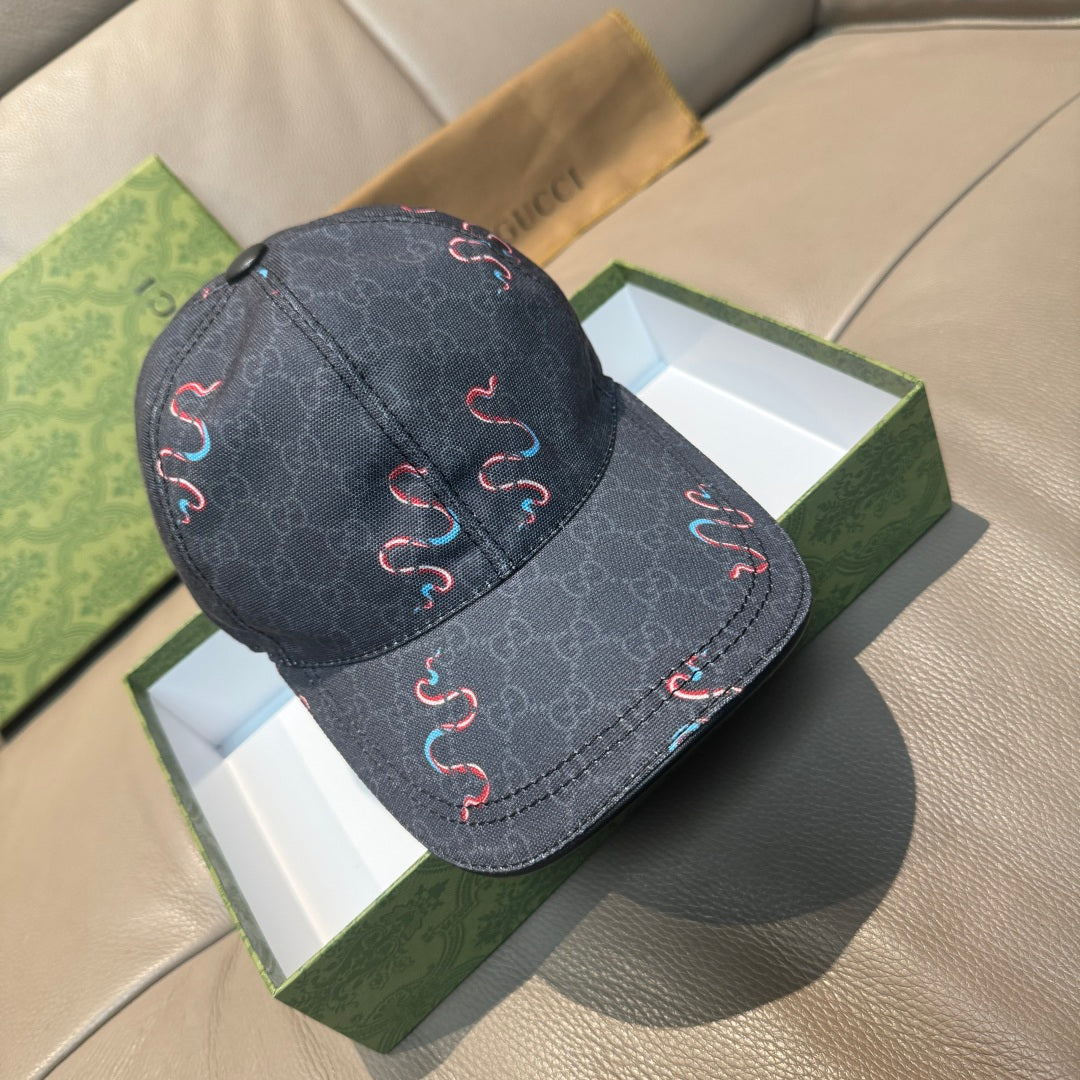 Gucci baseball cap in dark denim with red and blue embroidered pattern