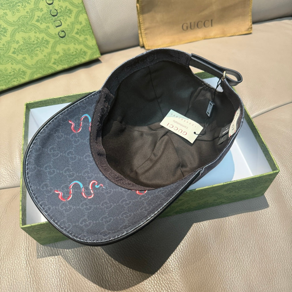 Gucci baseball cap shown from inside, dark denim with embroidered front panel