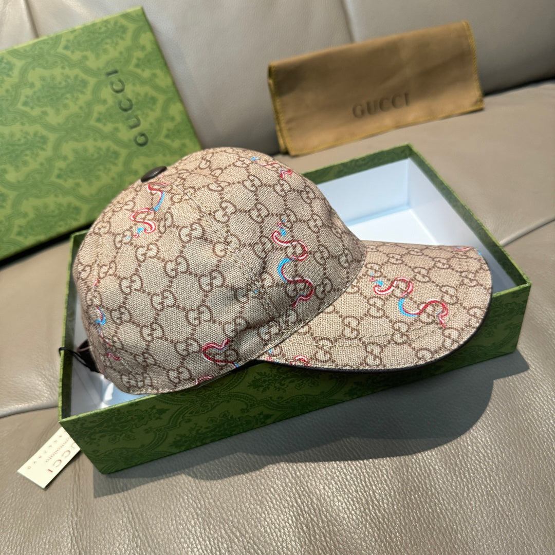 Beige Gucci baseball cap with multicolor snake pattern; view of side panels and brim