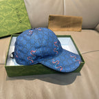 Gucci blue baseball cap with GG pattern and red horsebit embroidery