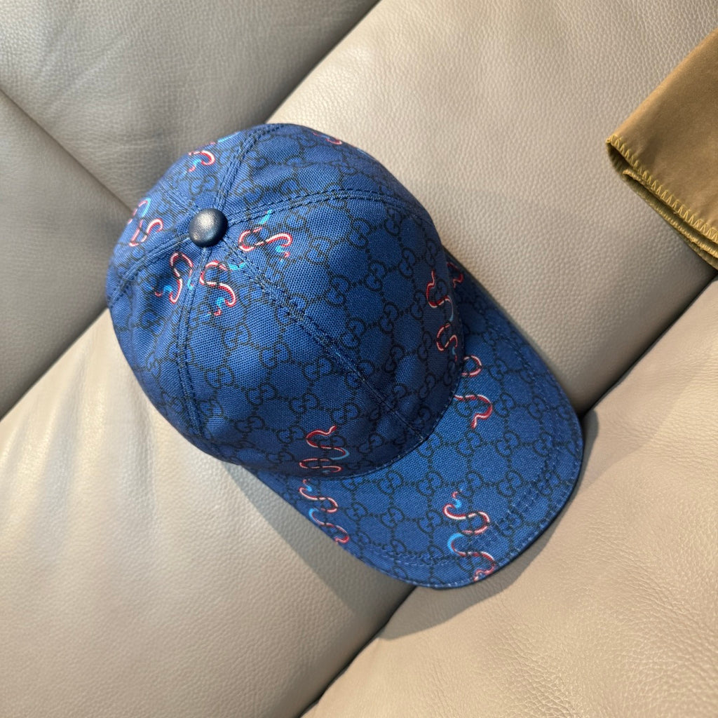 Gucci blue cap side view with GG pattern and red horsebit embroidery