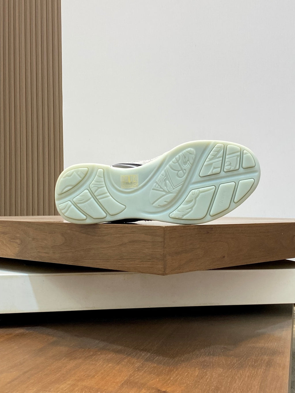 Burberry sneaker outsole with textured tread in pale mint color