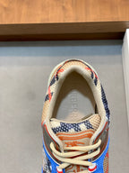 Sneaker interior with Burberry text, beige mesh lining, and multicolor trim