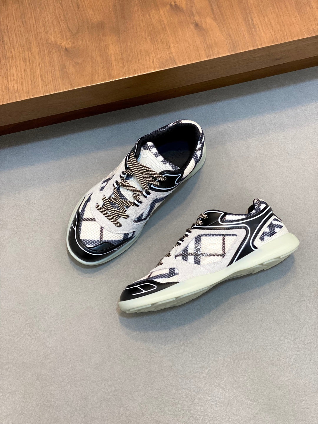 Burberry patterned sneakers with white upper, navy trim, and mint sole for everyday wear