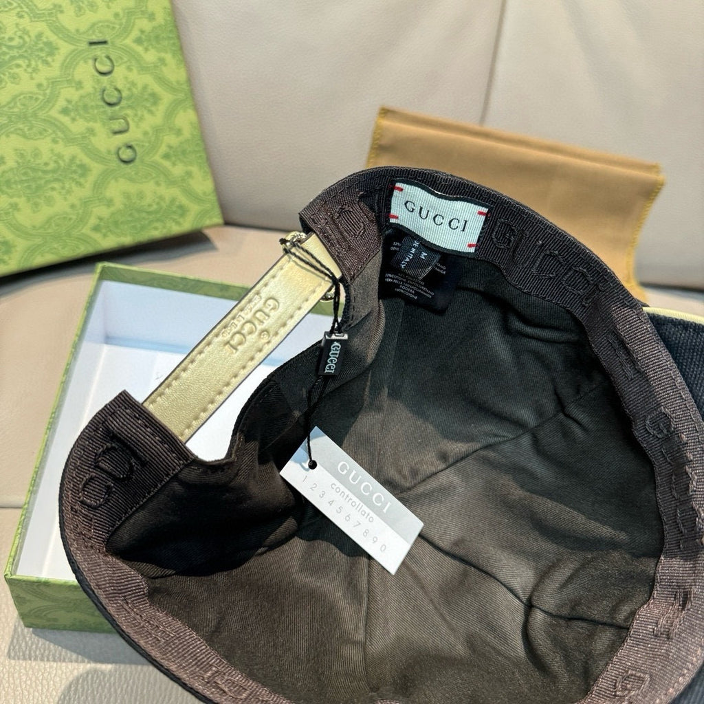 Gucci cap with dark interior and adjustable strap; inner Gucci label visible