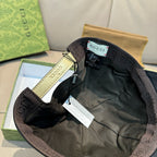 Gucci cap with dark interior and adjustable strap; inner Gucci label visible