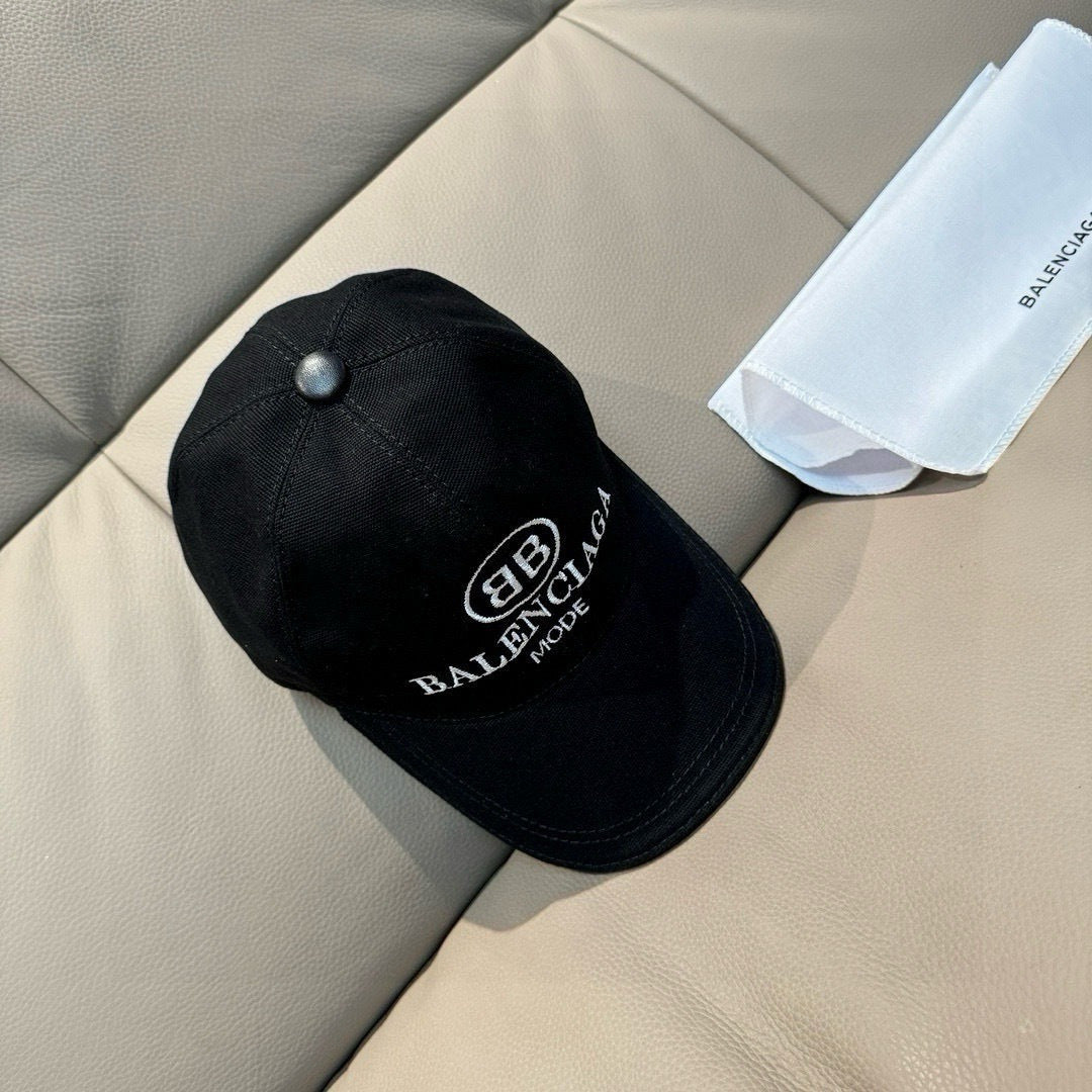 Black baseball cap with front logo patch and curved brim