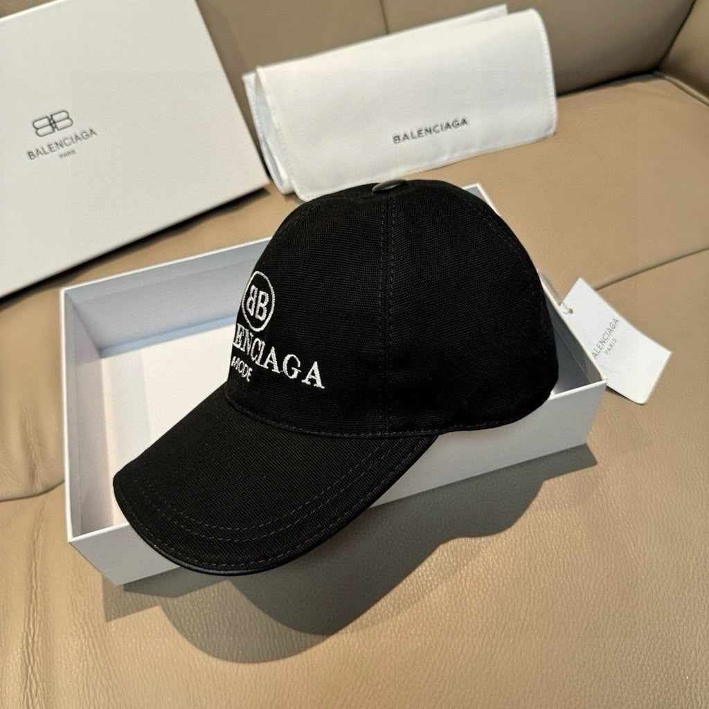 Black baseball cap with BALENCIAGA MODE logo on front panel