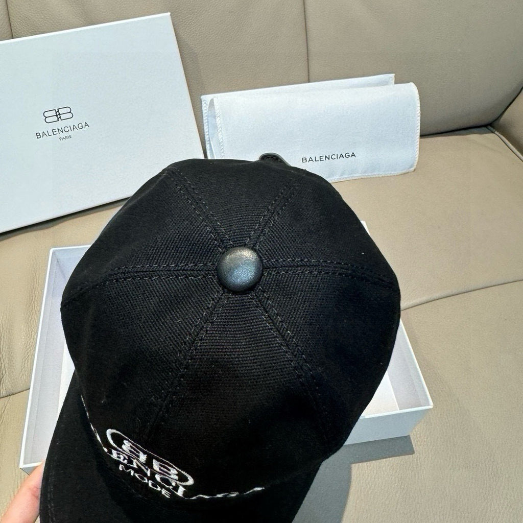 Black baseball cap back view with round top button