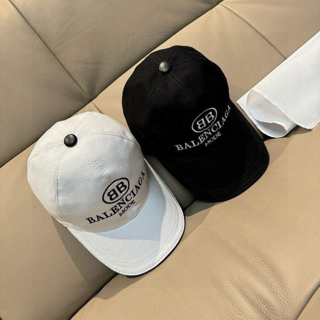 Set of two baseball caps: black and white with BALENCIAGA MODE logo