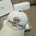 White Balenciaga baseball cap, front logo embroidery and stitched brim.
