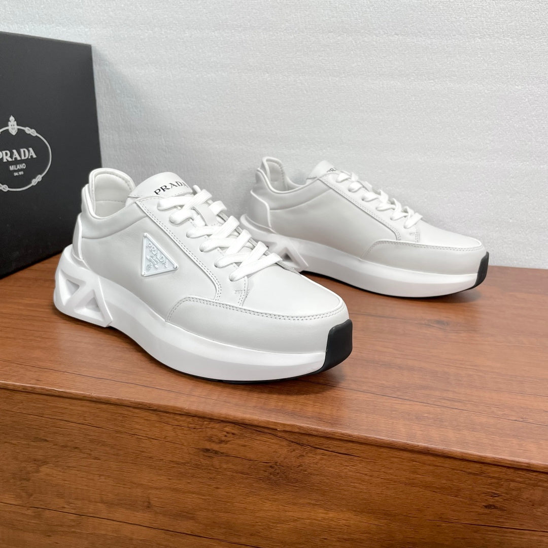 Prada unisex sneakers, white leather with triangular logo patch and thick sole