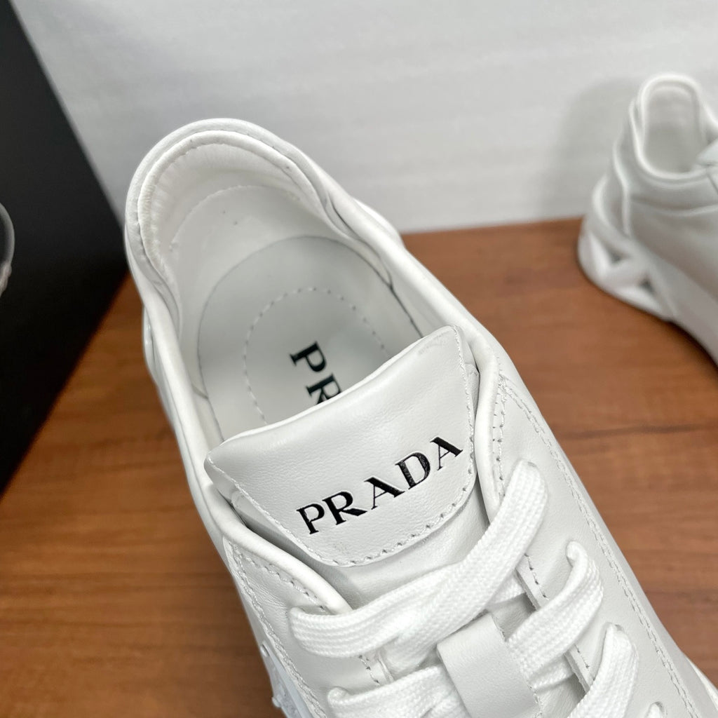 Prada unisex sneakers, white lace-up with PRADA logo on tongue lining