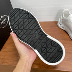 Prada unisex sneakers, black rubber tread outsole with PRADA logo