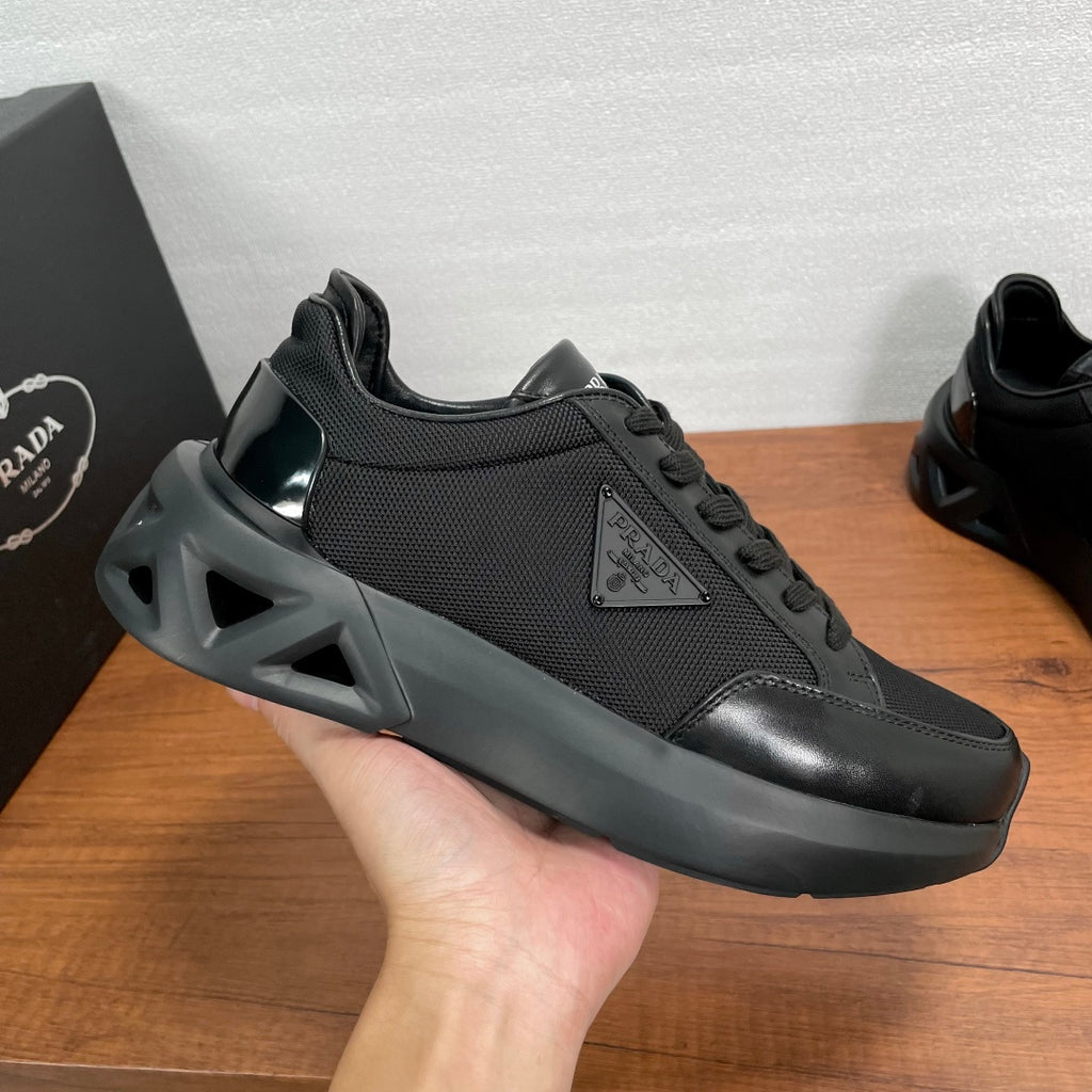 Prada unisex sneaker, black mesh upper with lace-up and side logo patch