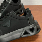 Prada unisex sneaker close-up of textured upper and chunky rubber sole