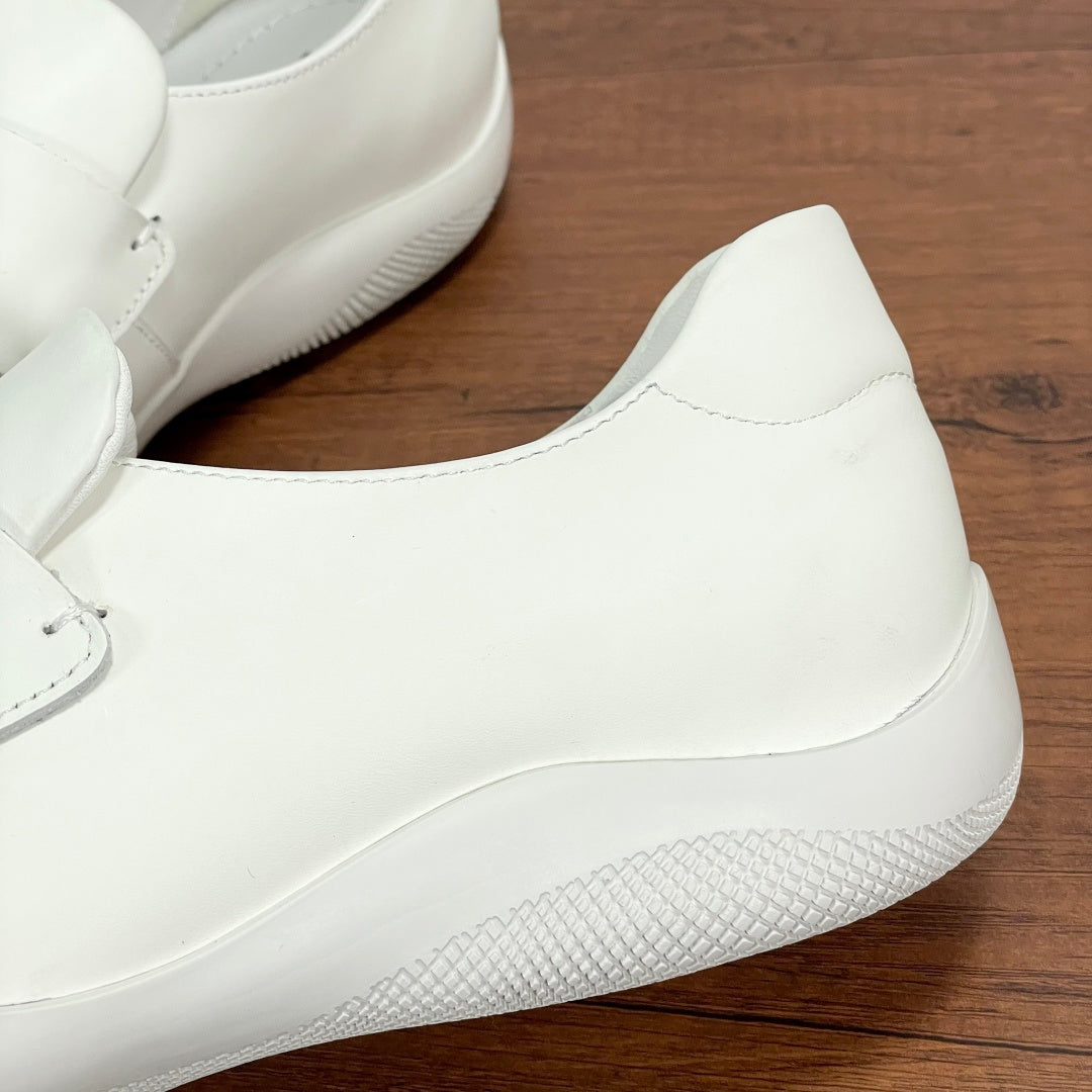 White Prada unisex loafer upper with stitched seam and rounded toe
