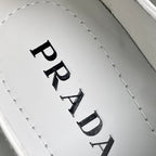 White insole with black PRADA lettering