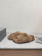 Taupe faux-fur slide sandals with rhinestone bow on the strap