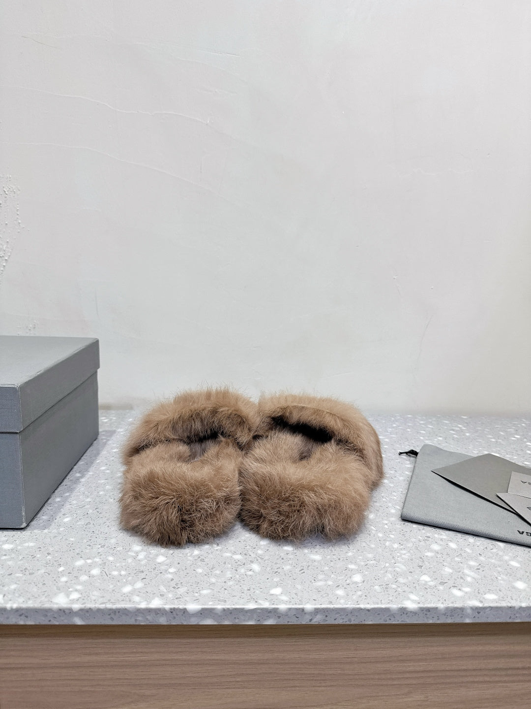 Taupe faux-fur slide sandals, open toe design with plush upper
