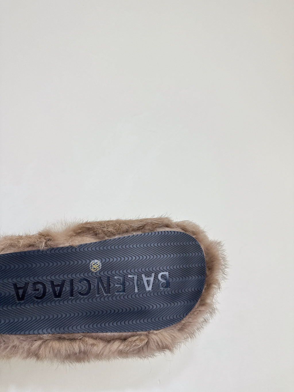 Blue rubber outsole of Balenciaga sandals with textured logo grip