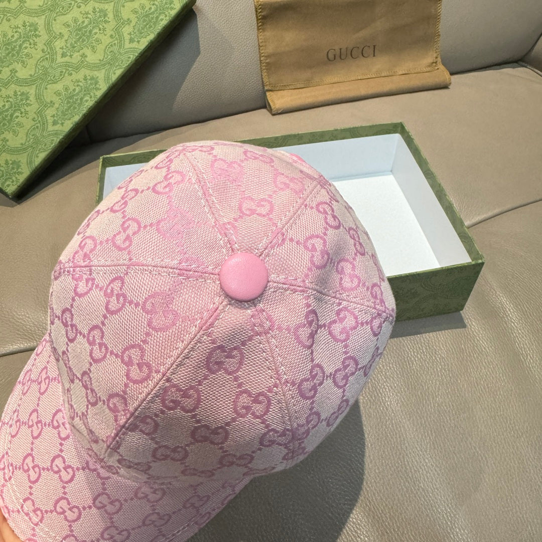 Pink GG-logo baseball cap top view with small round button