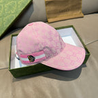 Pink GG-logo baseball cap, side view, striped band with tiger head patch