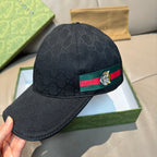 Gucci black baseball cap with bee crest badge on Web stripe