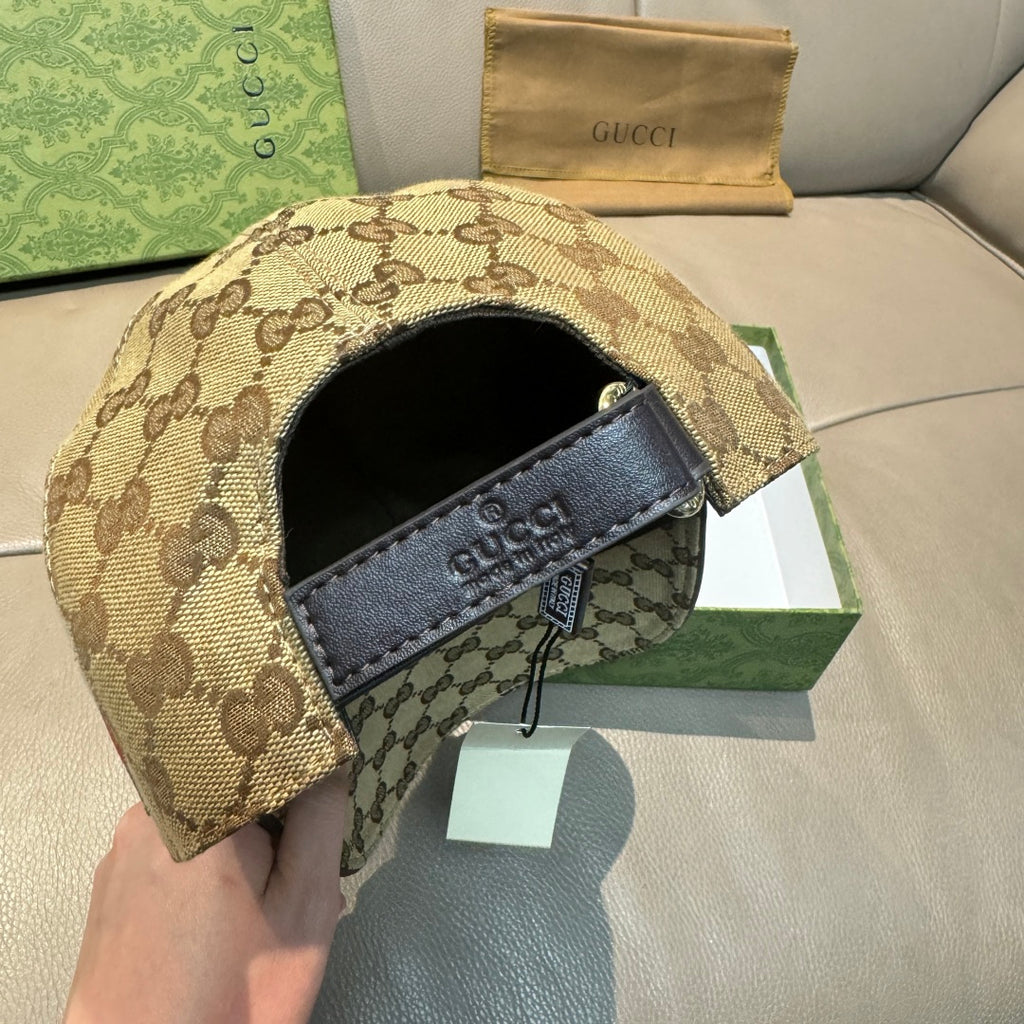 Gucci cap interior showing black lining and beige GG canvas under brim label